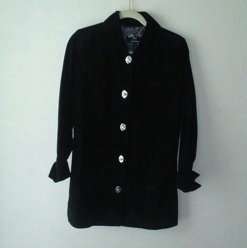 A black suede coat .